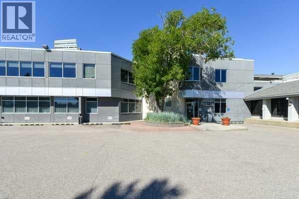office at #102, 5917 1A Street SW — $409,000