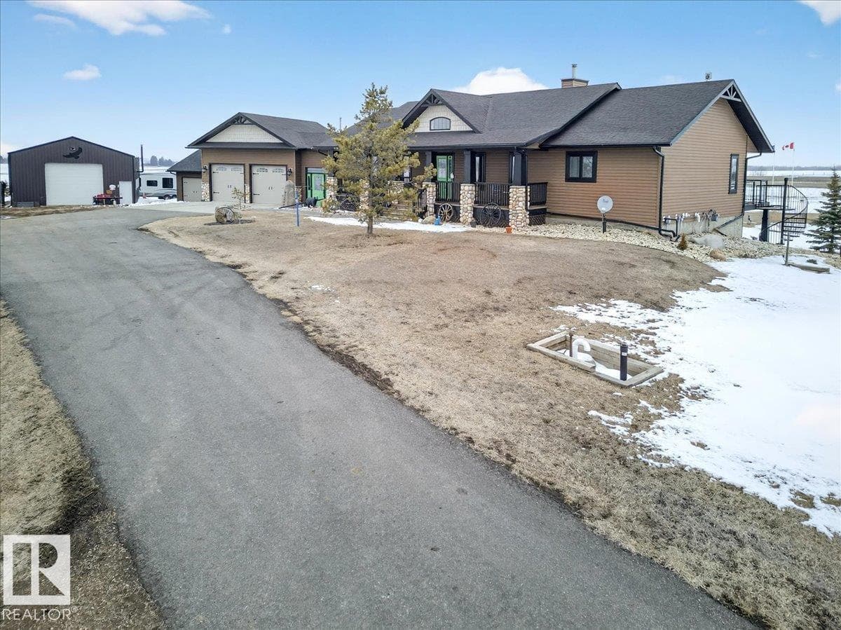 4 bed 3 bath single family at 531064 Range Road 174 — $1,350,000