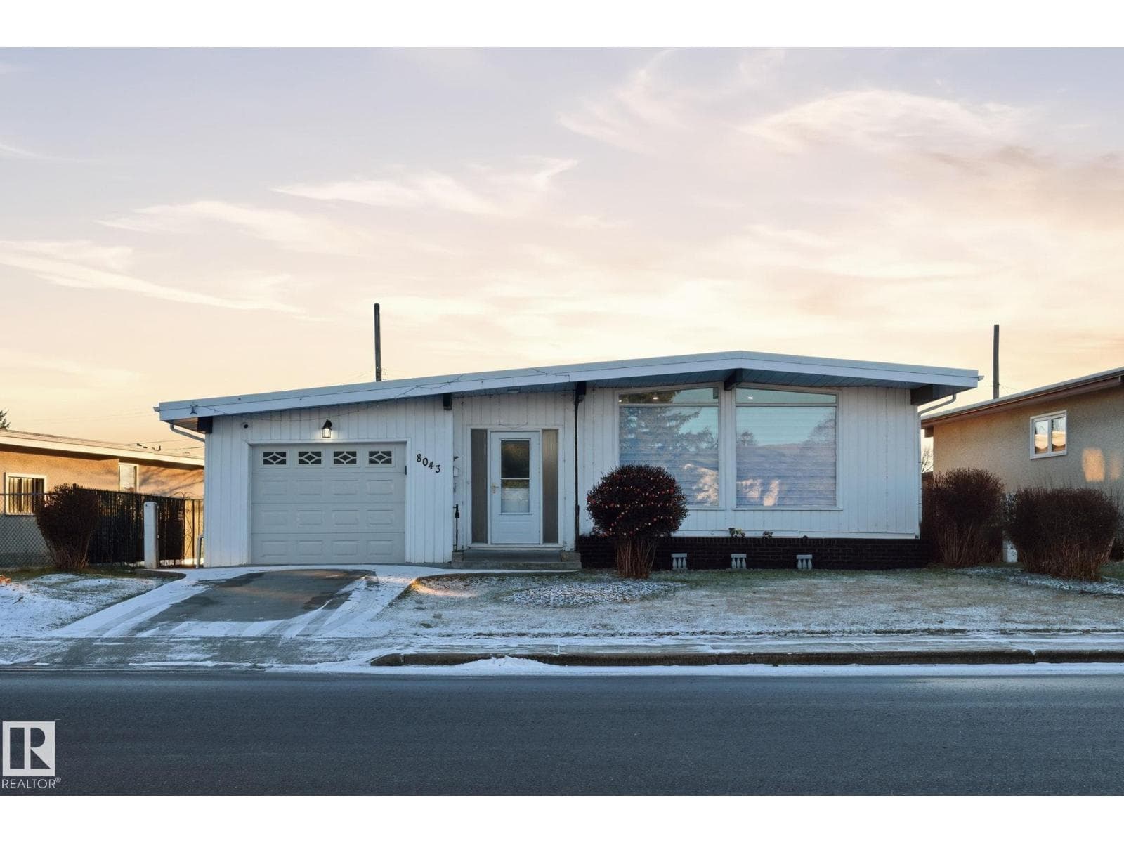 5 bed 3 bath single family at 8043 135 AV NW — $499,900