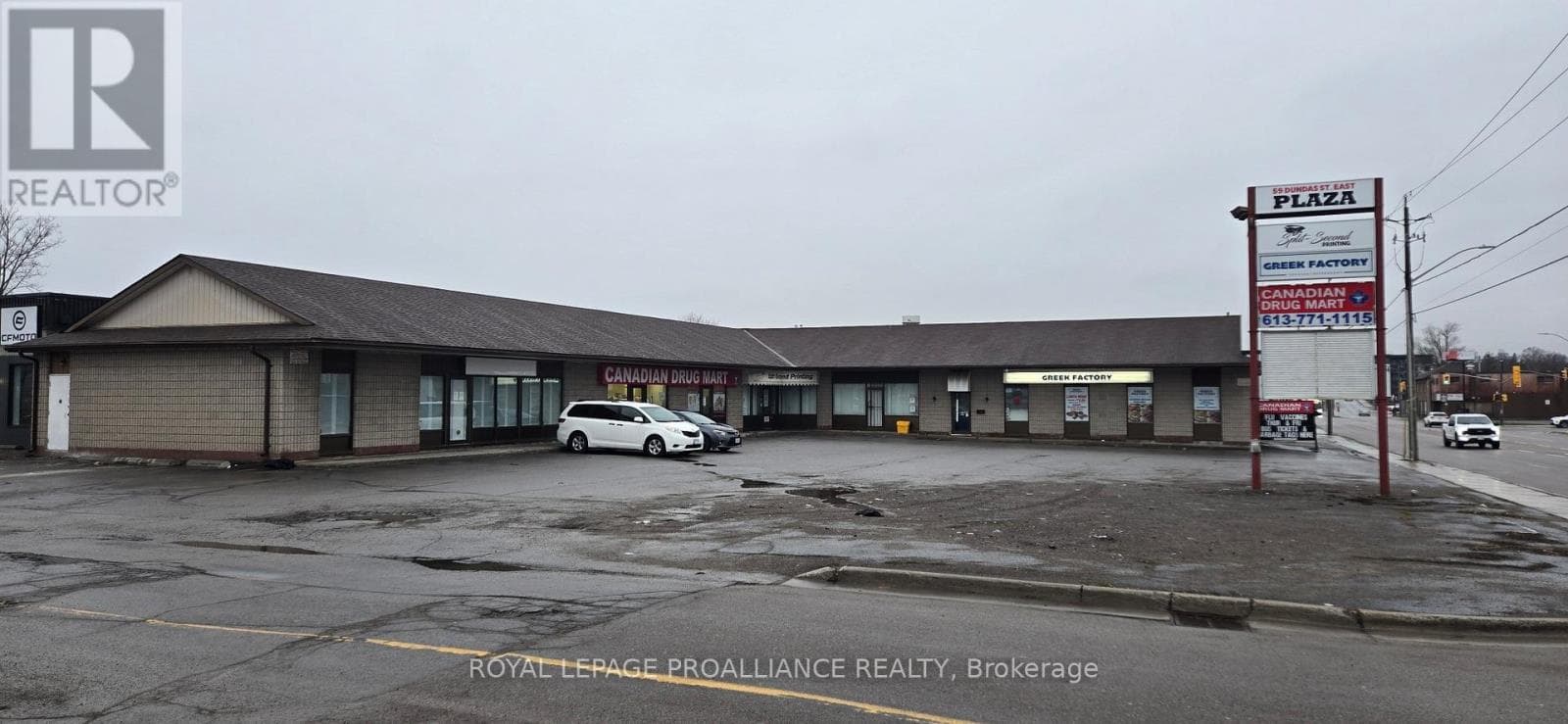 business at 59 DUNDAS STREET E — $2,100,000