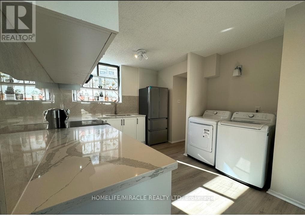 303 - 665 KENNEDY ROAD photo 3