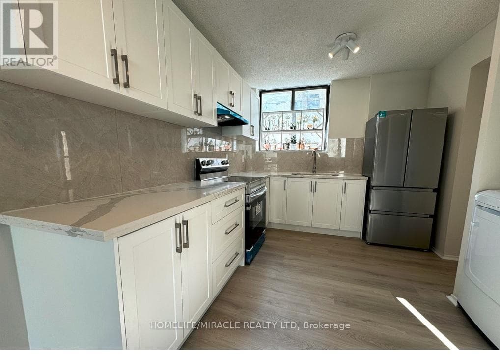 303 - 665 KENNEDY ROAD photo 4