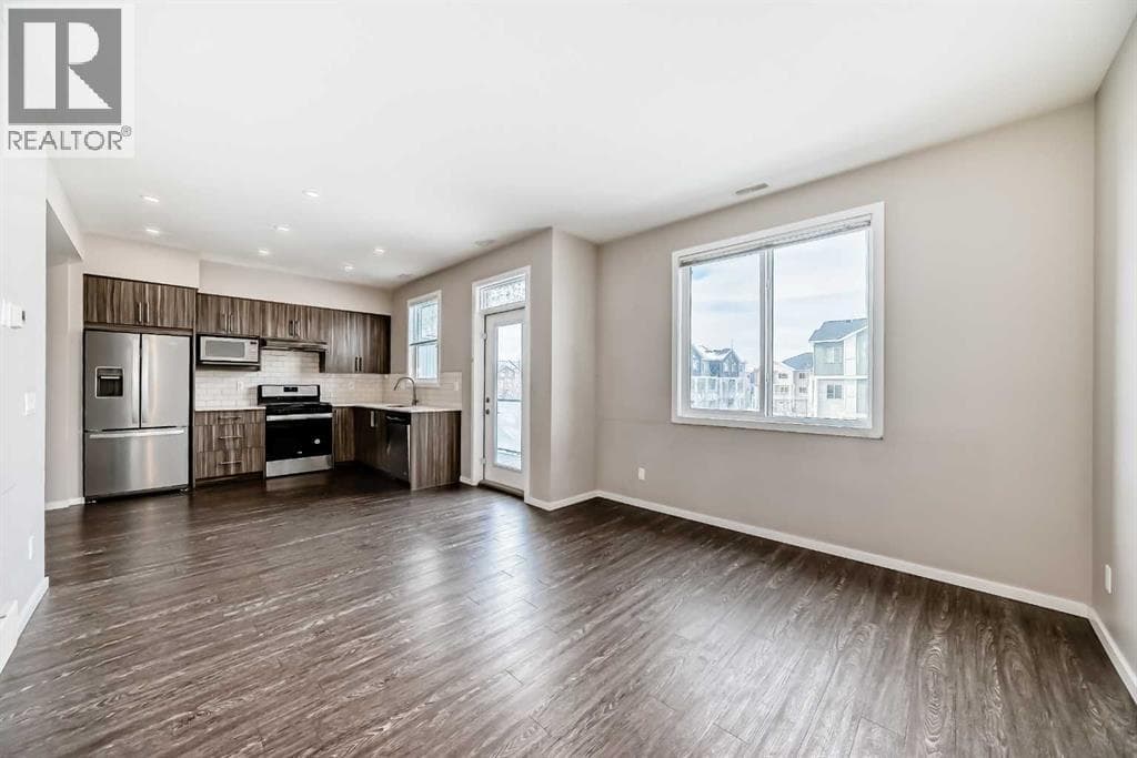203, 225 Redstone Walk NE photo 5