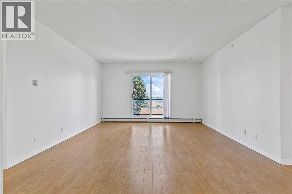 304, 2022 Canyon Meadows Drive SE photo 3