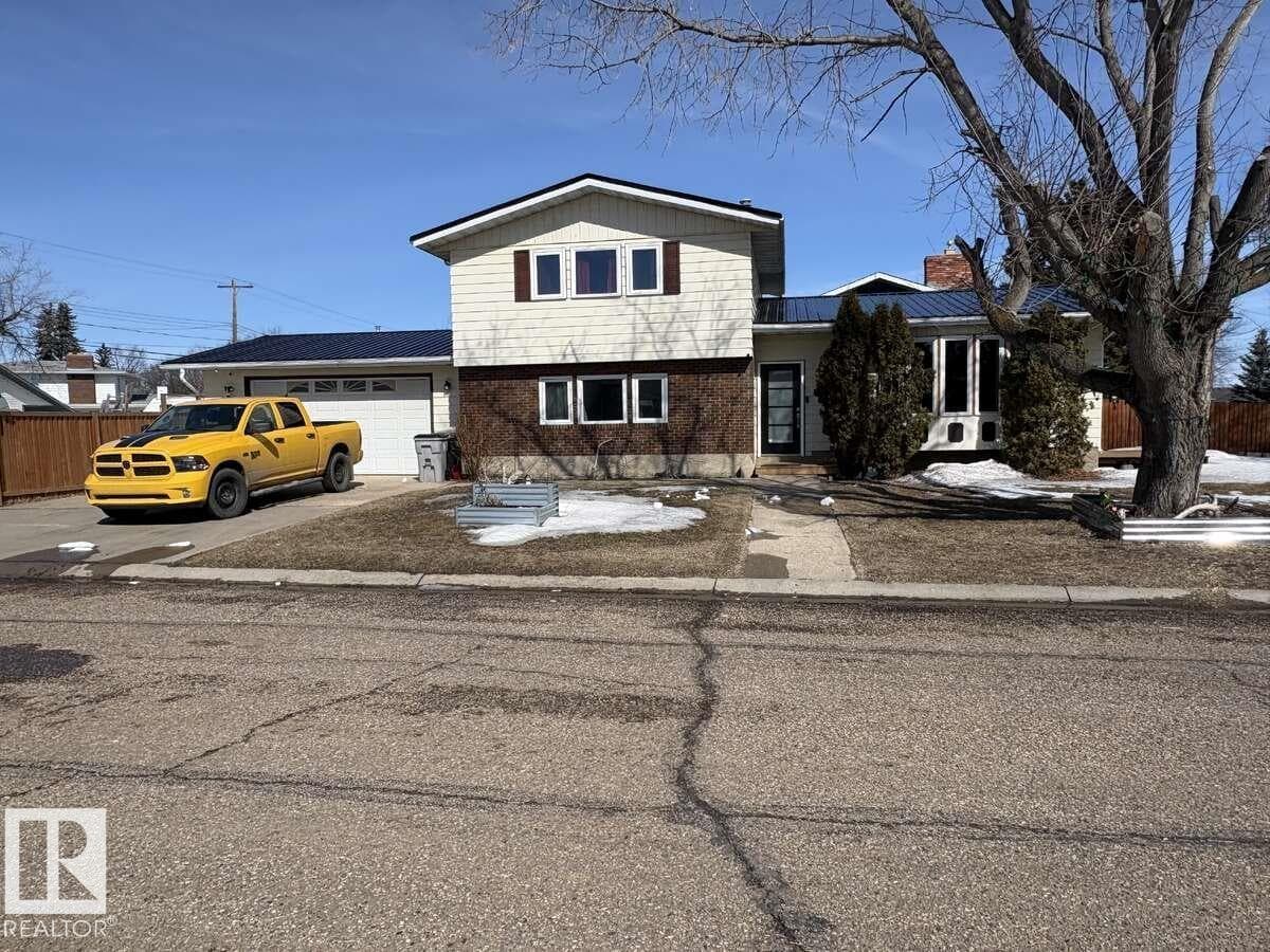 4 bed 3 bath single family at 5204 47 ST — $454,450