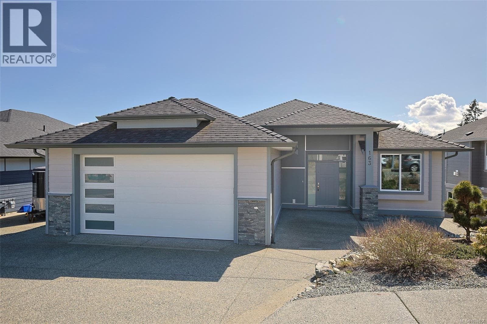 7 bed 4 bath single family at 163 Golden Oaks Cres — $1,299,000