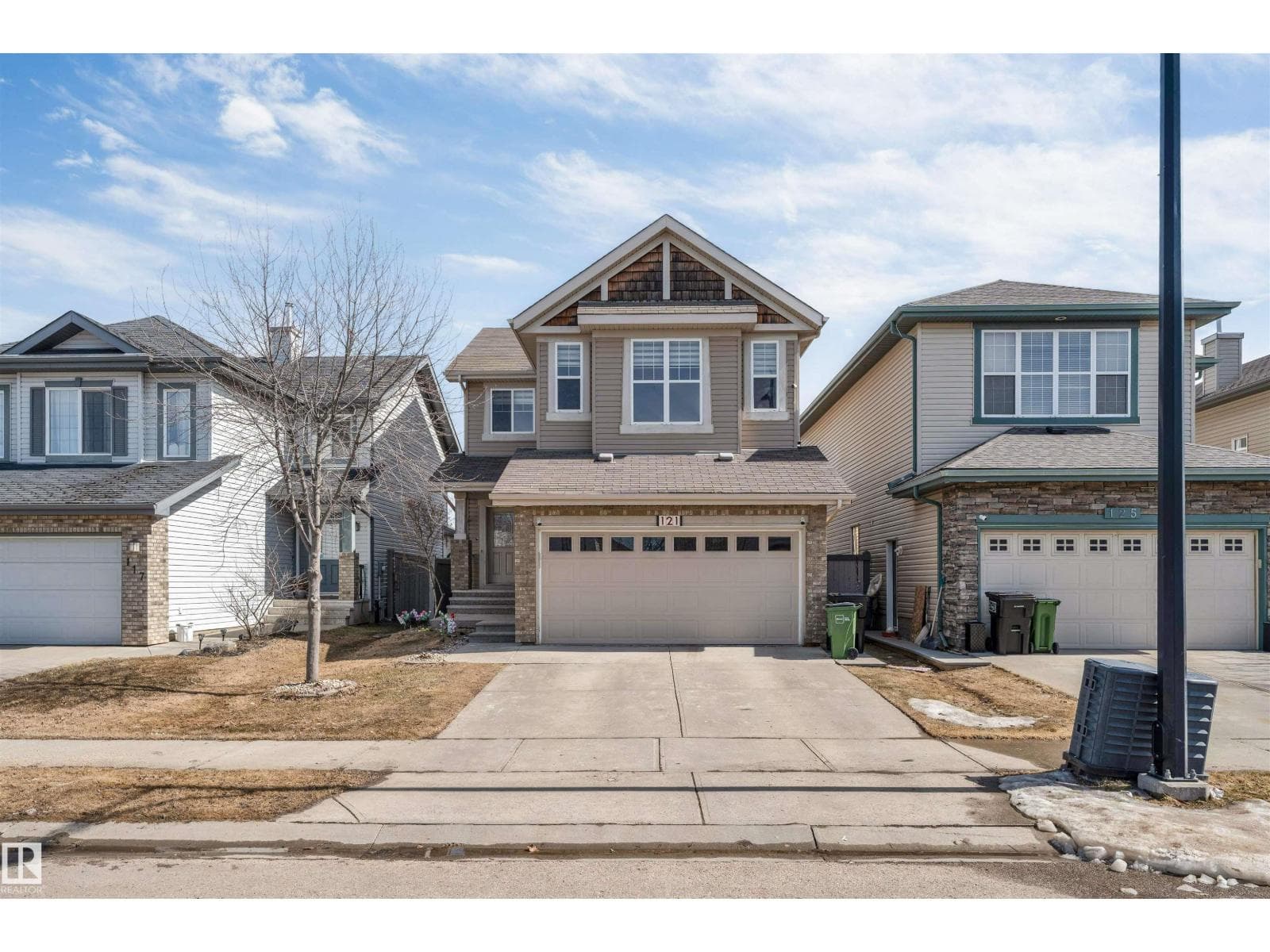 5 bed 4 bath single family at 121 64 ST SW — $619,900