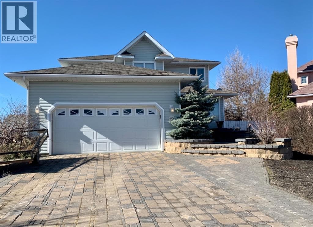 5 bed 4 bath single family at 9106 93 Ave — $529,900