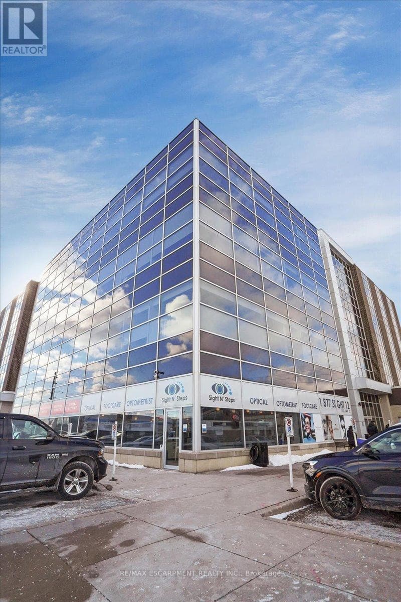 business at 103 - 300 ROSSLAND ROAD E — $399,000