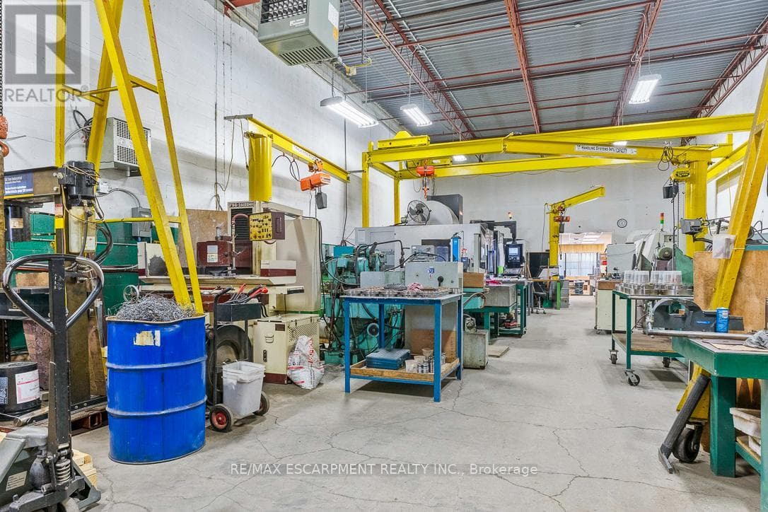 business at 11 - 2430 LUCKNOW DRIVE — $699,000