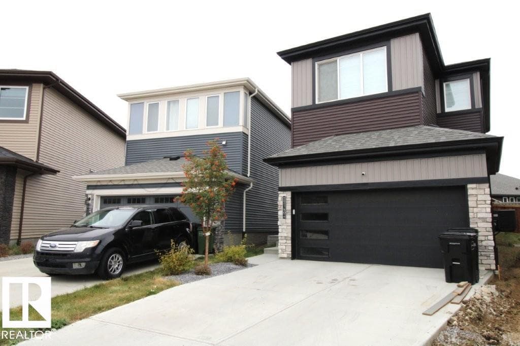 4 bed 4 bath single family at 22140 81 AV NW — $645,000