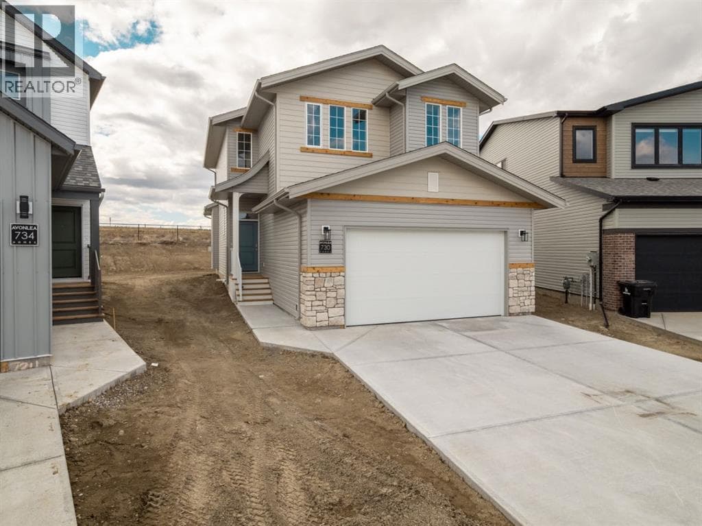 3 bed 3 bath single family at 730 Violet Place W — $609,900