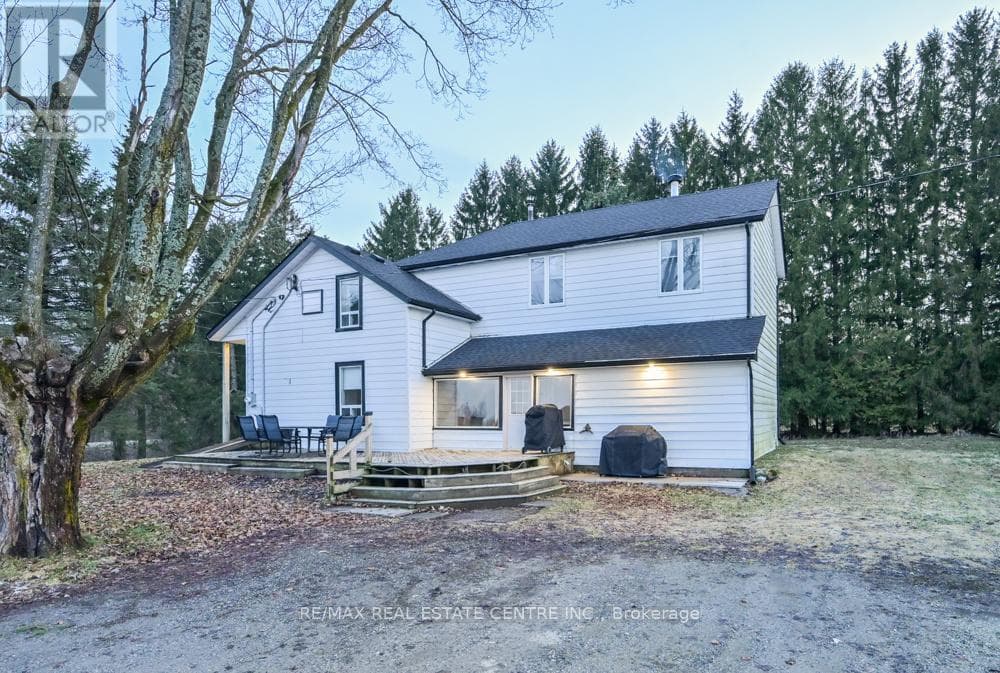 4 bed 3 bath single family at 347157 MONO CENTRE ROAD E — $1,495,000