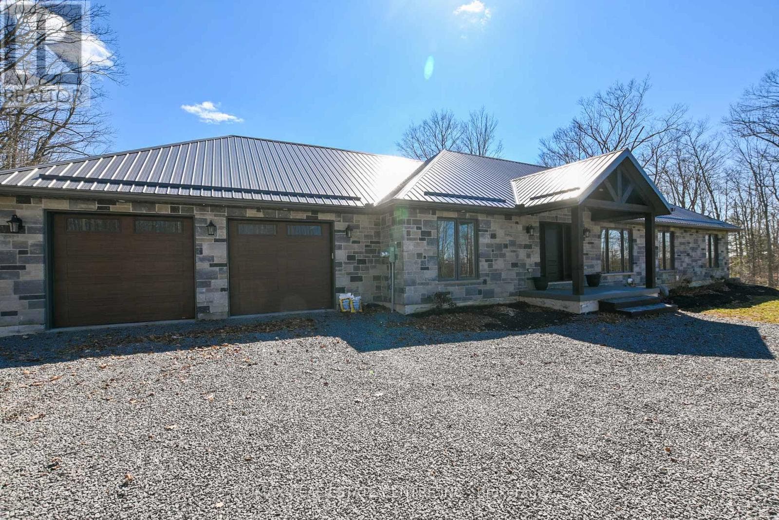 4 bed 3 bath single family at 1765 10TH LINE WEST — $1,429,000