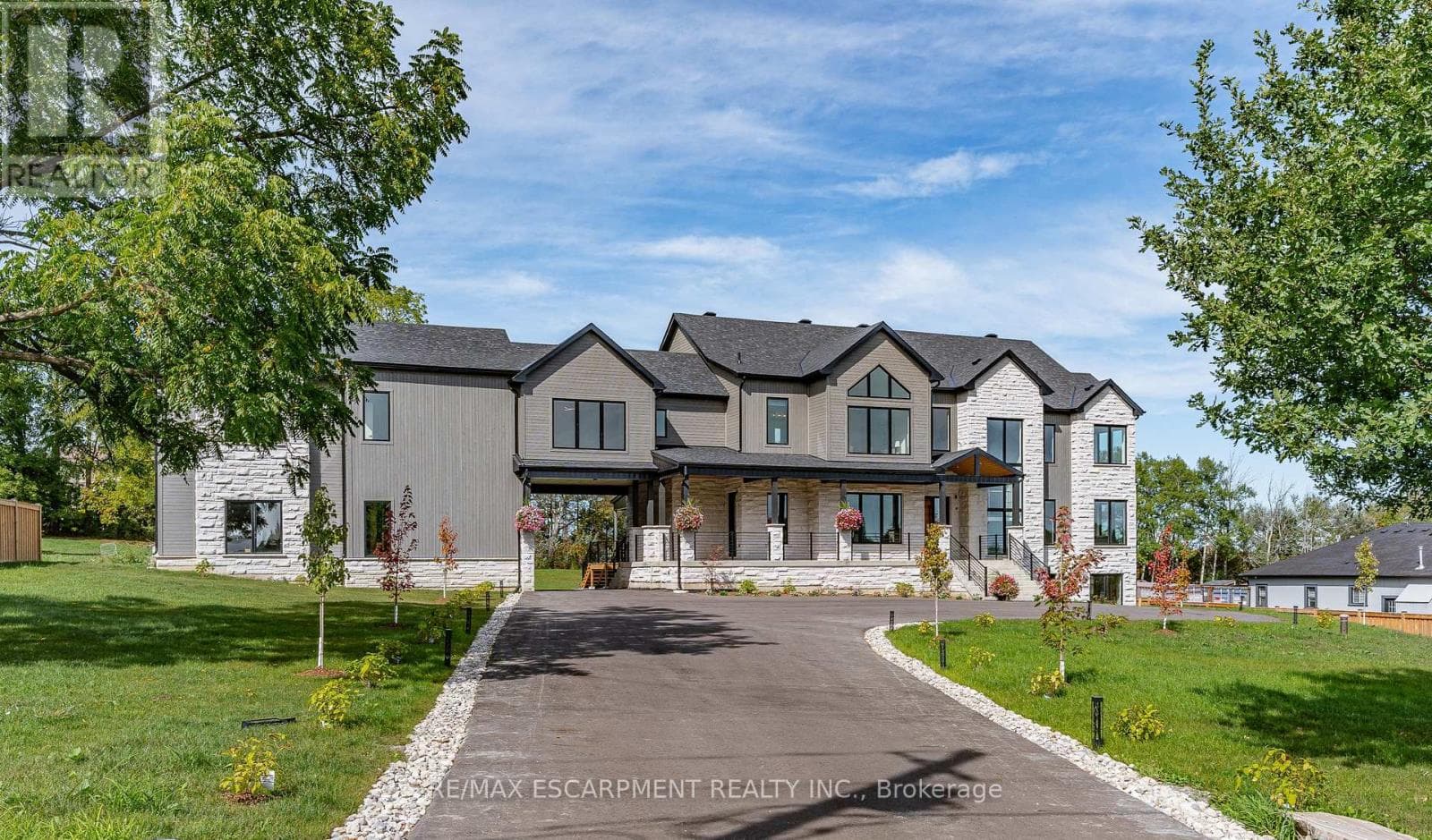 5 bed 6 bath single family at 8920 WELLINGTON RD 124 — $2,998,000