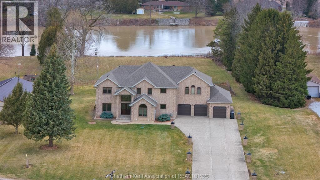 4 bed 4 bath single family at 7057 Riverview LINE — $1,050,000