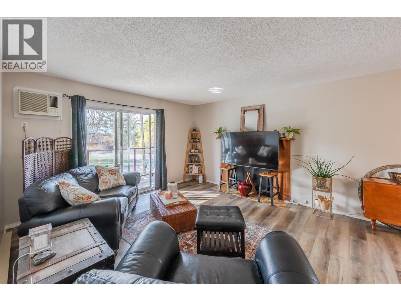 110 Skaha Place Unit# 303 photo 2