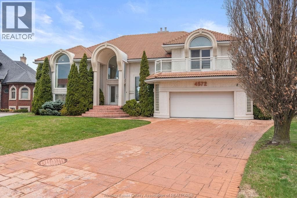 5 bed 5 bath single family at 4572 LAKE GRANDE COURT — $1,489,000