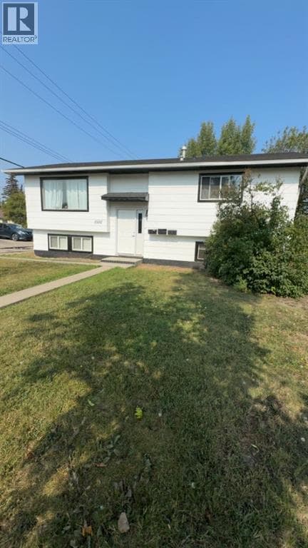 4 bed 3 bath single family at 10132 102 Avenue — $369,900