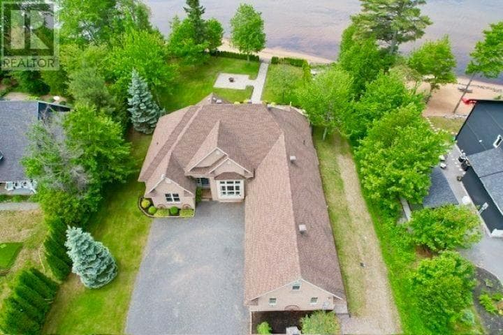 4 bed 3 bath single family at 857 Sunnyside Beach RD — $1,269,000