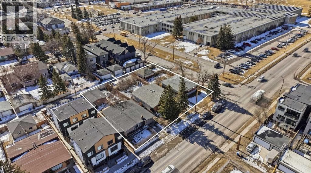 9 bed 5 bath single family at 2135, 2139, 2143 50 Avenue SW — $3,450,000