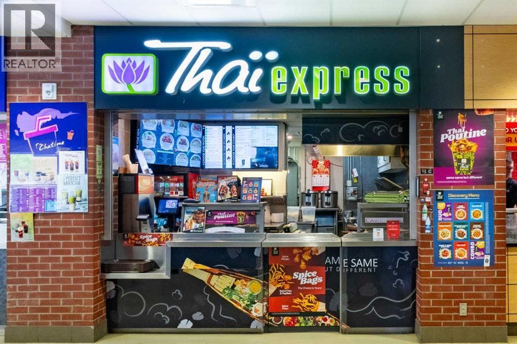 business at #Z-118, 4825 Mount Royal Gate SW — $400,000
