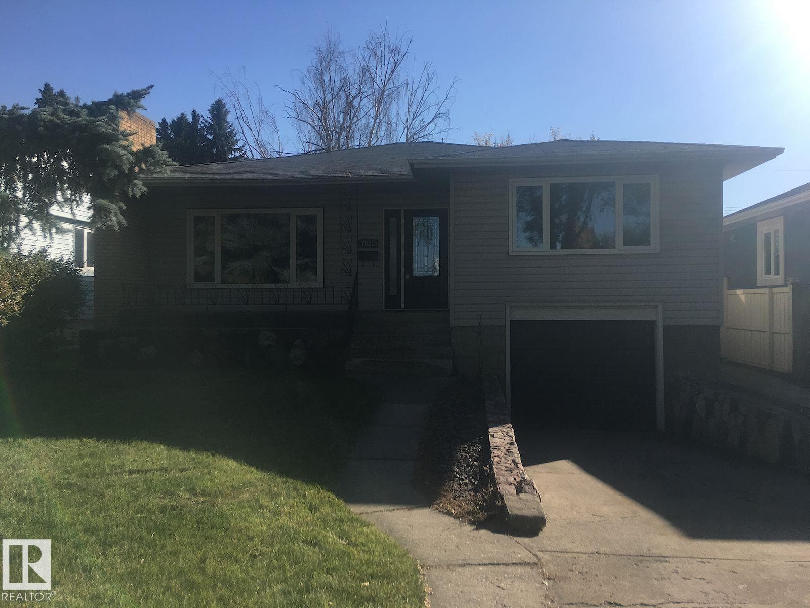 6 bed 2 bath single family at 7921 97 AV NW — $589,900