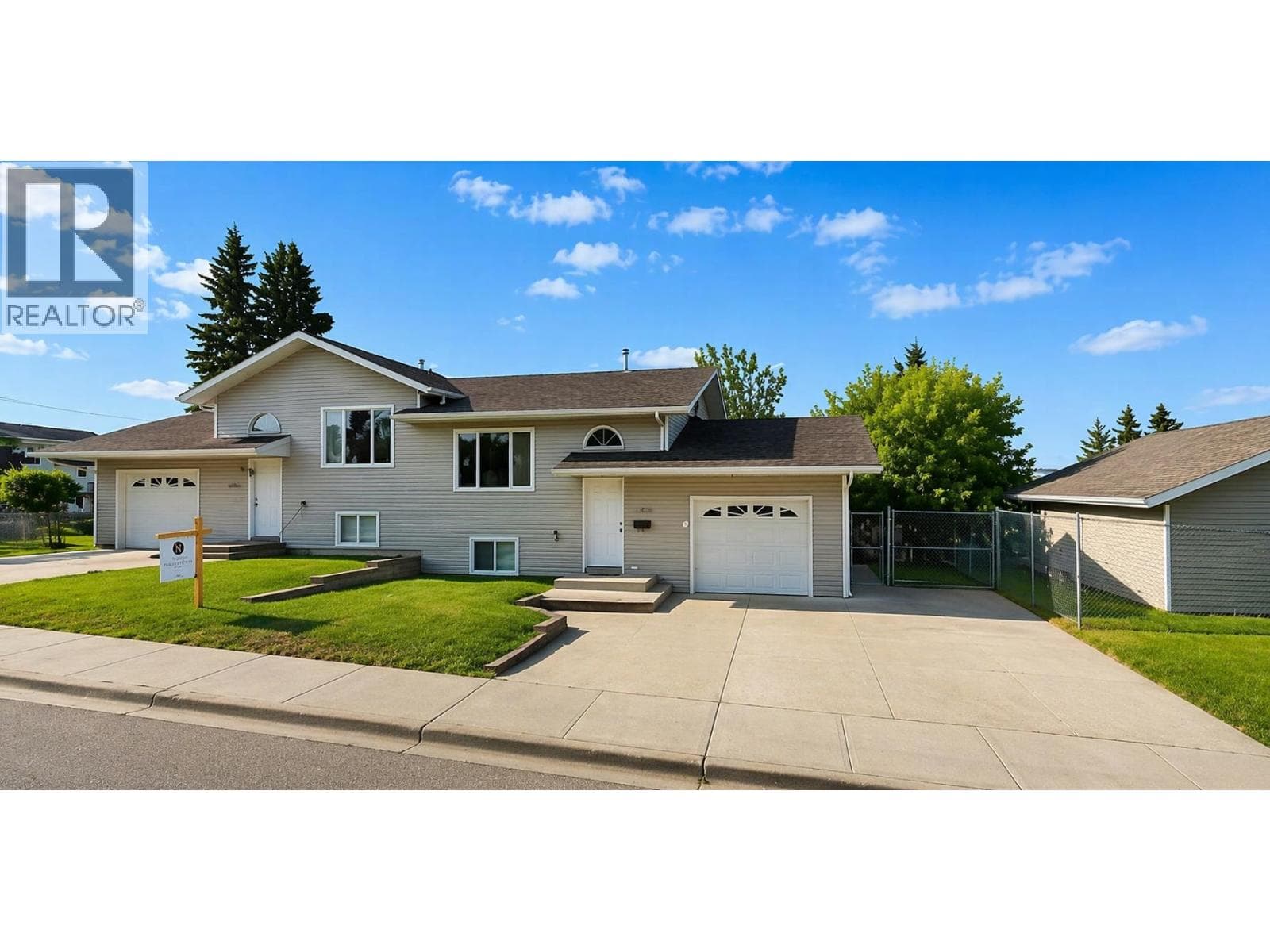 3 bed 2 bath multi-family at 8703-8707 89 AVENUE — $599,900