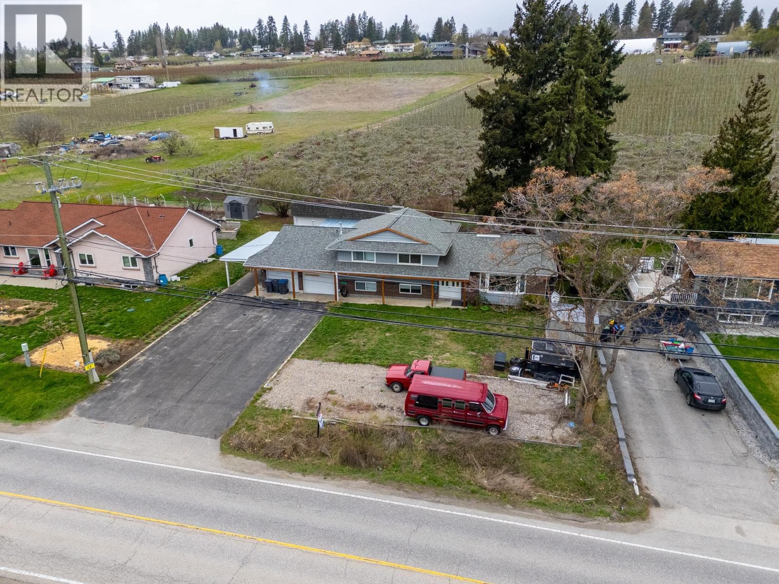 4 bed 4 bath single family at 11438 Okanagan Centre Road E — $949,900