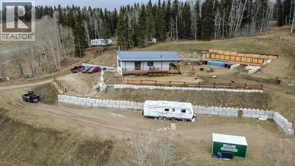 4 bed 3 bath single family at 33143 Range Road 60 — $1,000,000