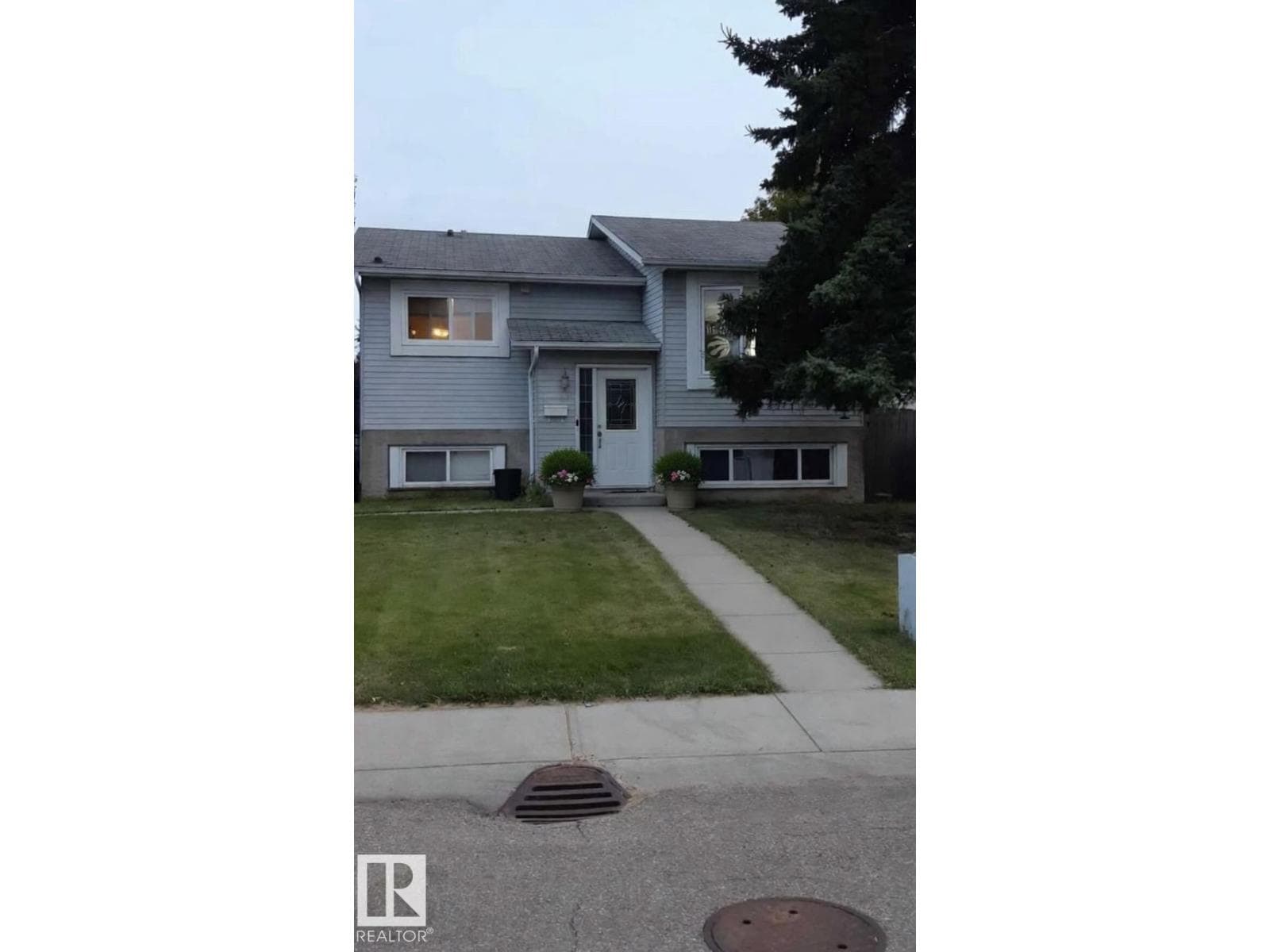 5 bed 2 bath single family at 6333 11 AV NW — $349,900
