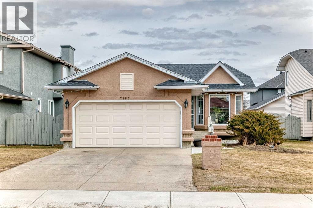 4 bed 3 bath single family at 7165 California Boulevard NE — $749,900