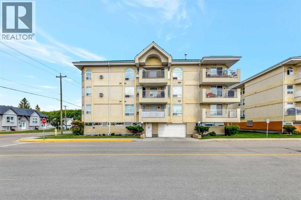 2 bed 2 bath single family at 201, 5120 49 Street — $224,900