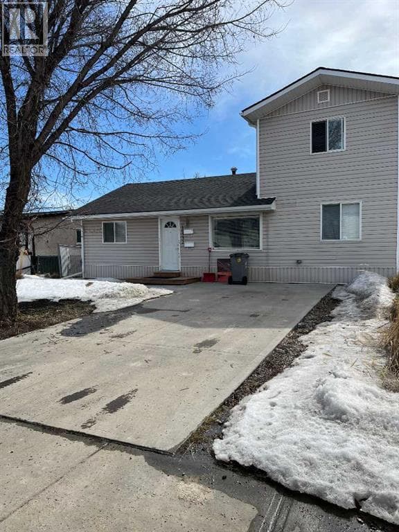 5 bed 3 bath single family at 10531 104 Avenue — $520,000