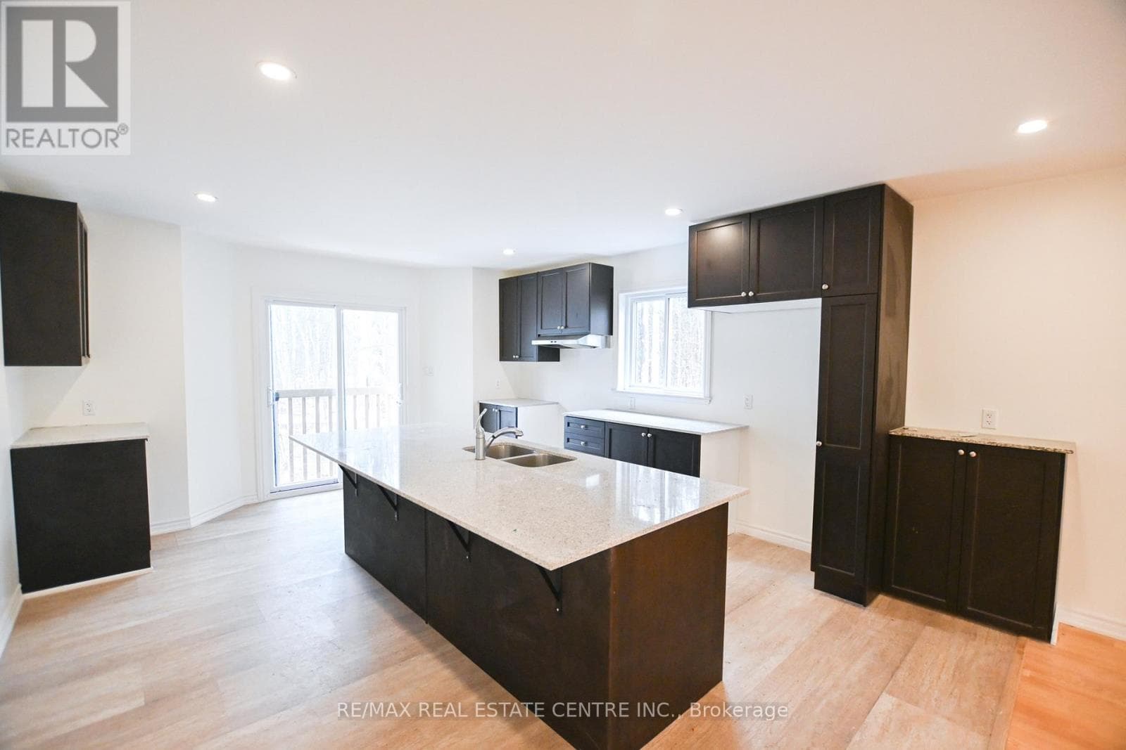 4 bed 3 bath single family at 1078 SOUTH KAHSHE LAKE ROAD E — $579,900