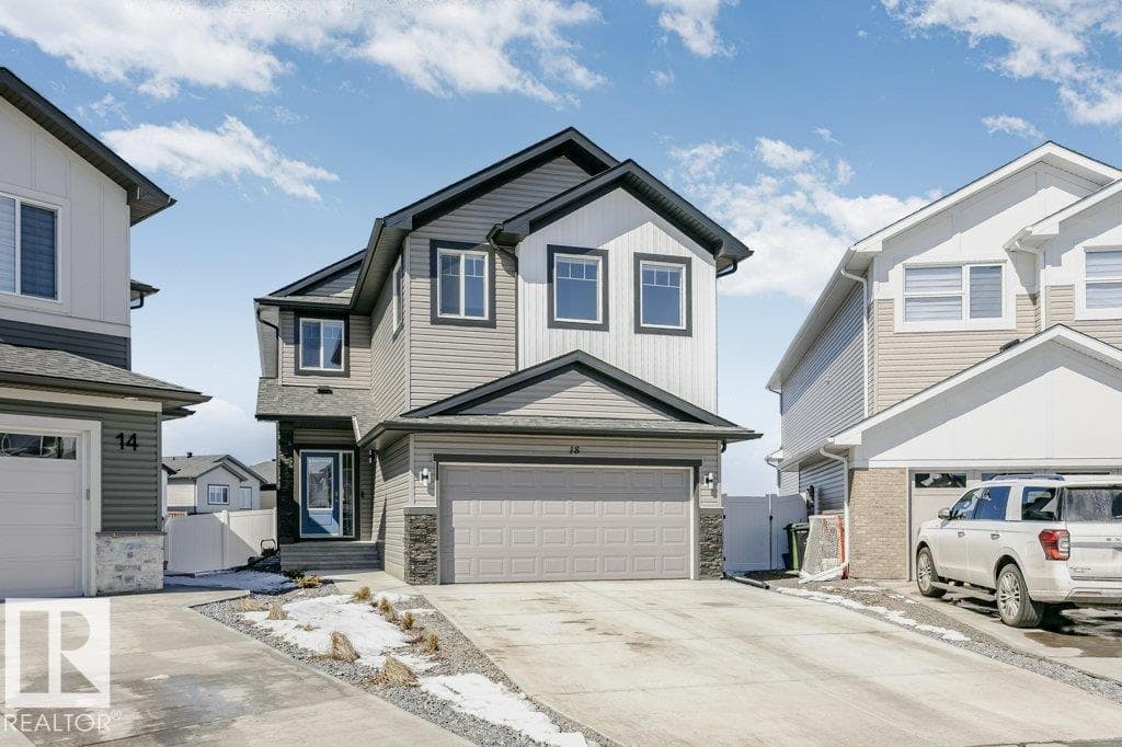 5 bed 4 bath single family at 18 ELDERBERRY PT — $724,000