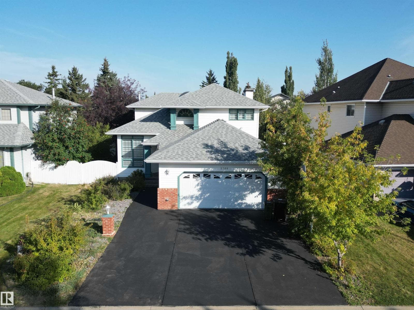 4 bed 4 bath single family at 2908 44A AV NW — $560,000