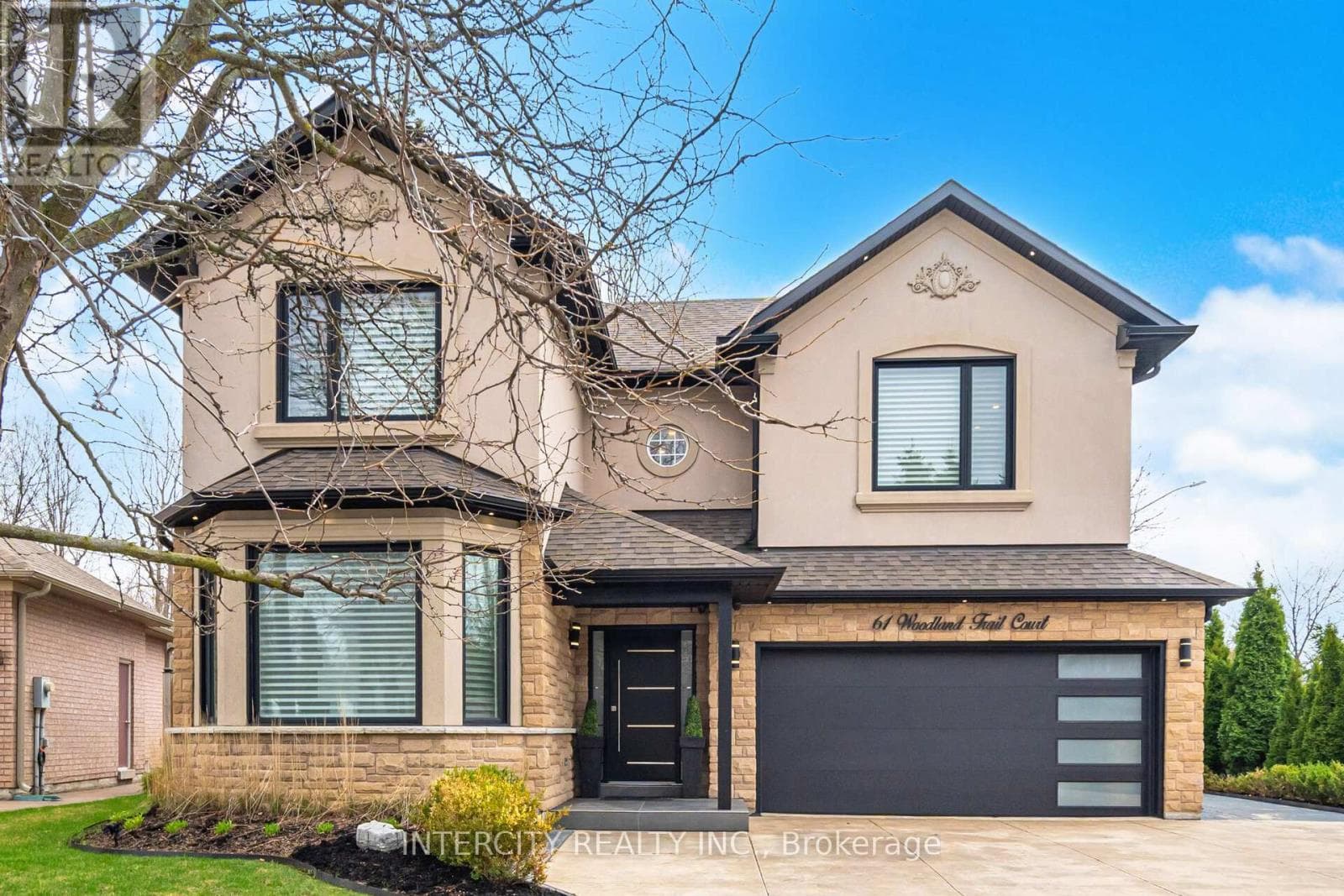4 bed 4 bath single family at 61 WOODLAND TRAIL COURT — $1,997,000