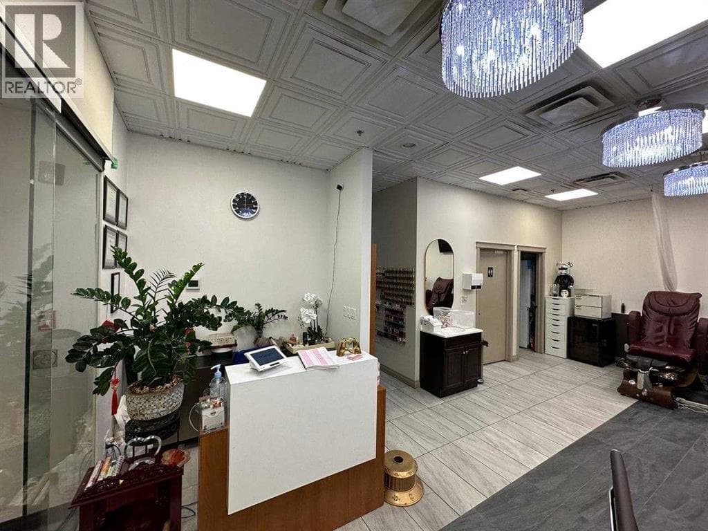 business at 222, 1632 14 Avenue NW — $139,800