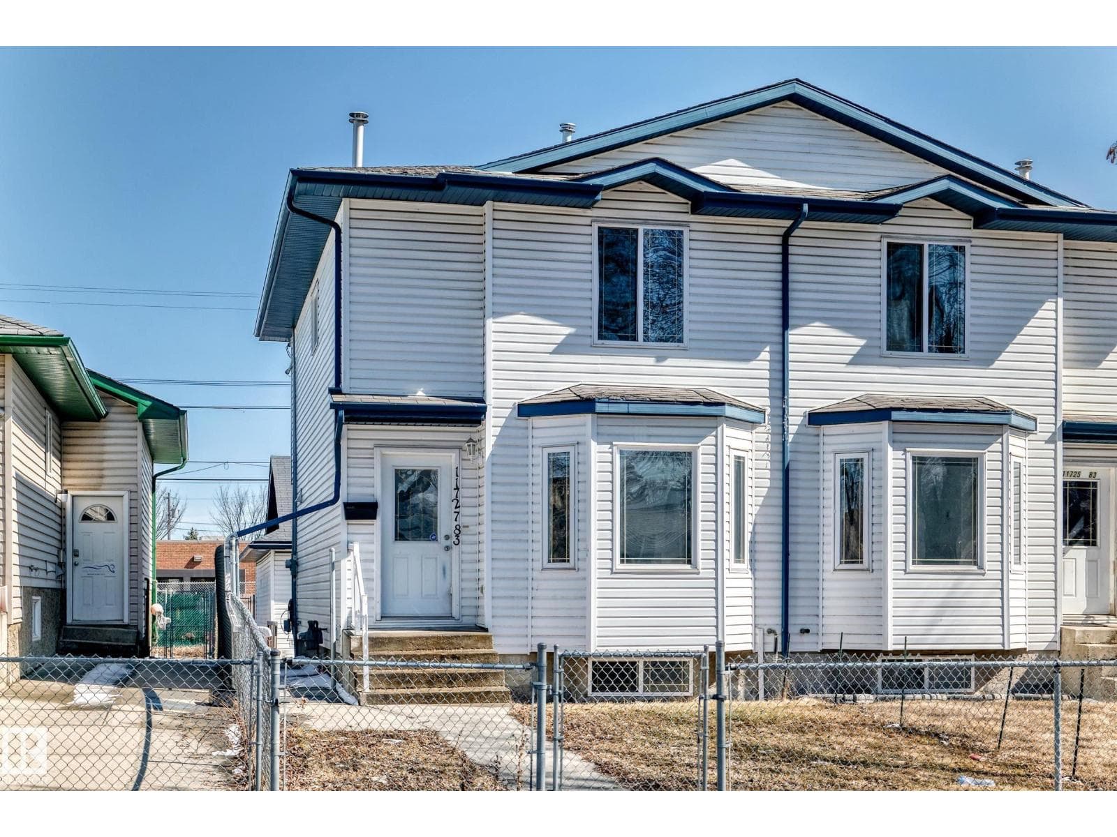 4 bed 2 bath single family at 11727 83 ST NW — $334,900