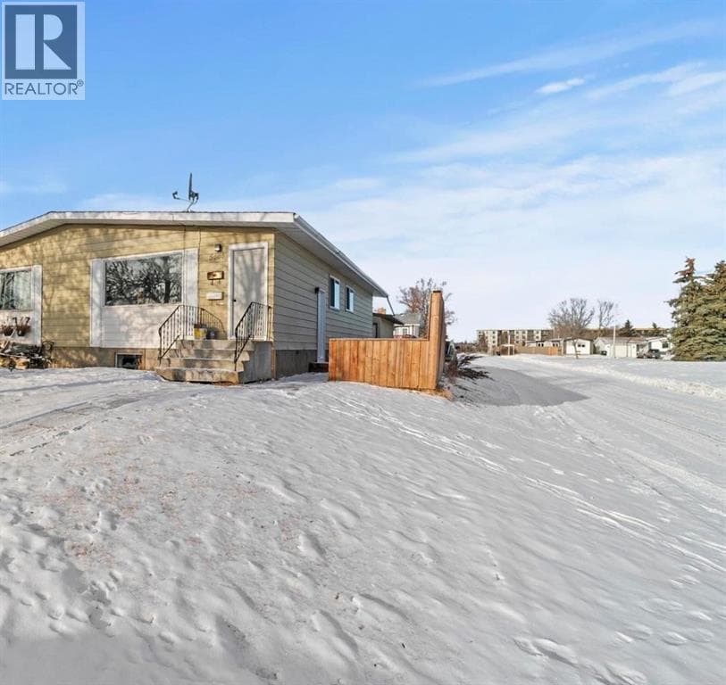 6 bed 2 bath single family at 5444 50 Street — $279,900