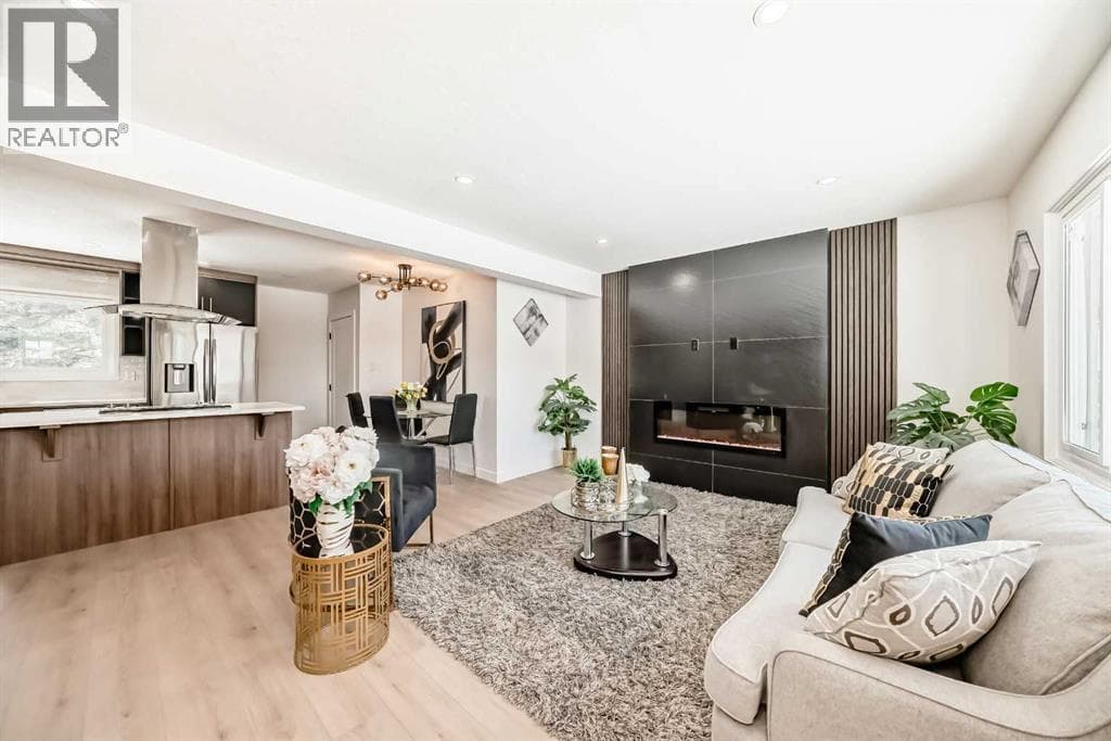 5 bed 2 bath single family at 4936 45 Street SW — $769,900