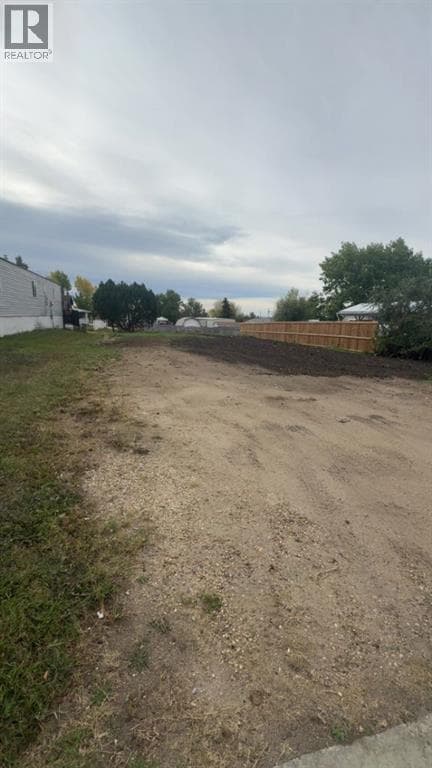 vacant land at 9729 120 Avenue — $110,000