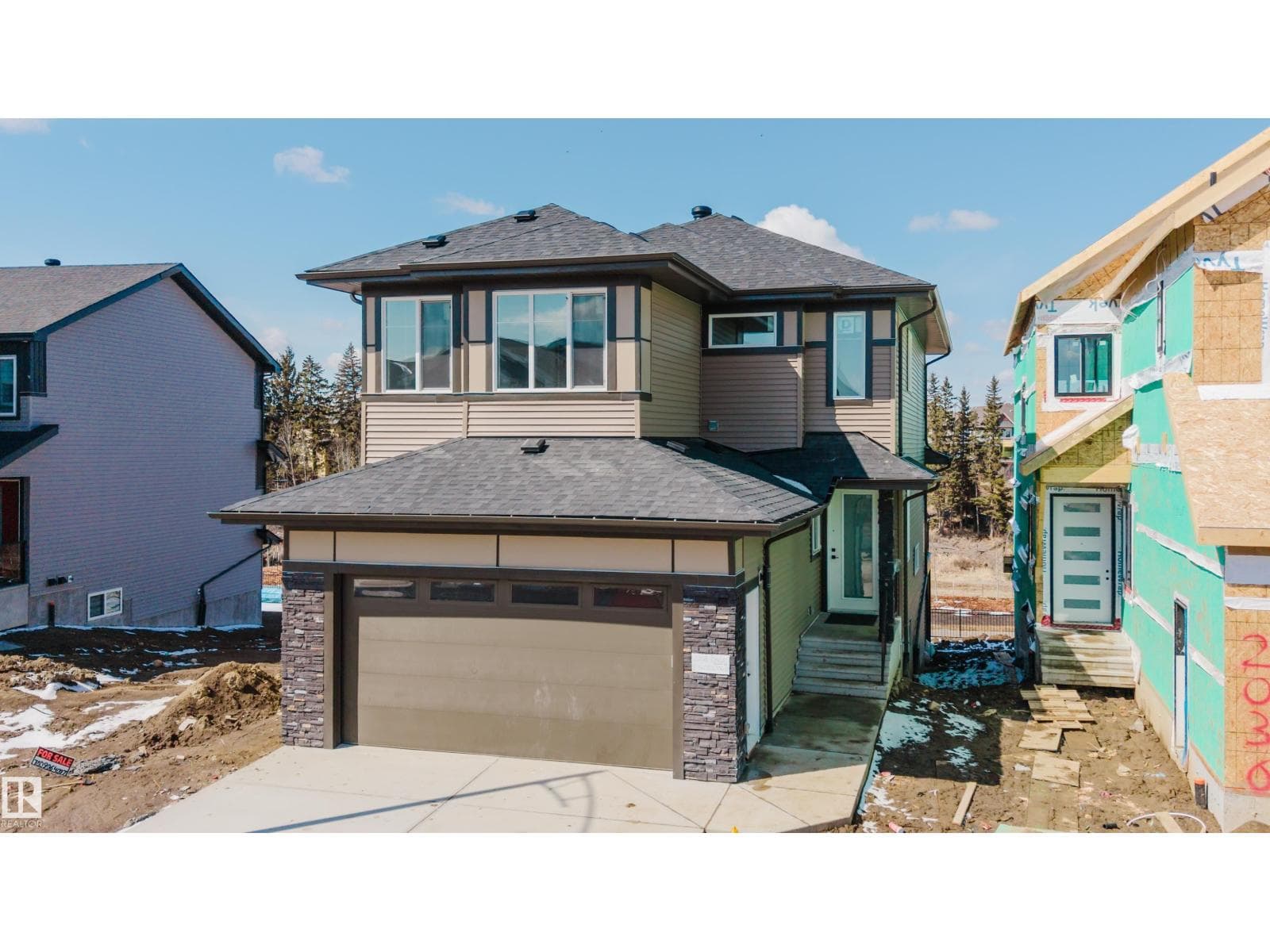 4 bed 3 bath single family at 2038 Collip Crescent SW — $775,000