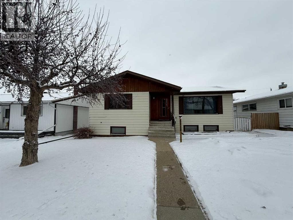 3 bed 3 bath single family at 5112 55 Ave — $324,900