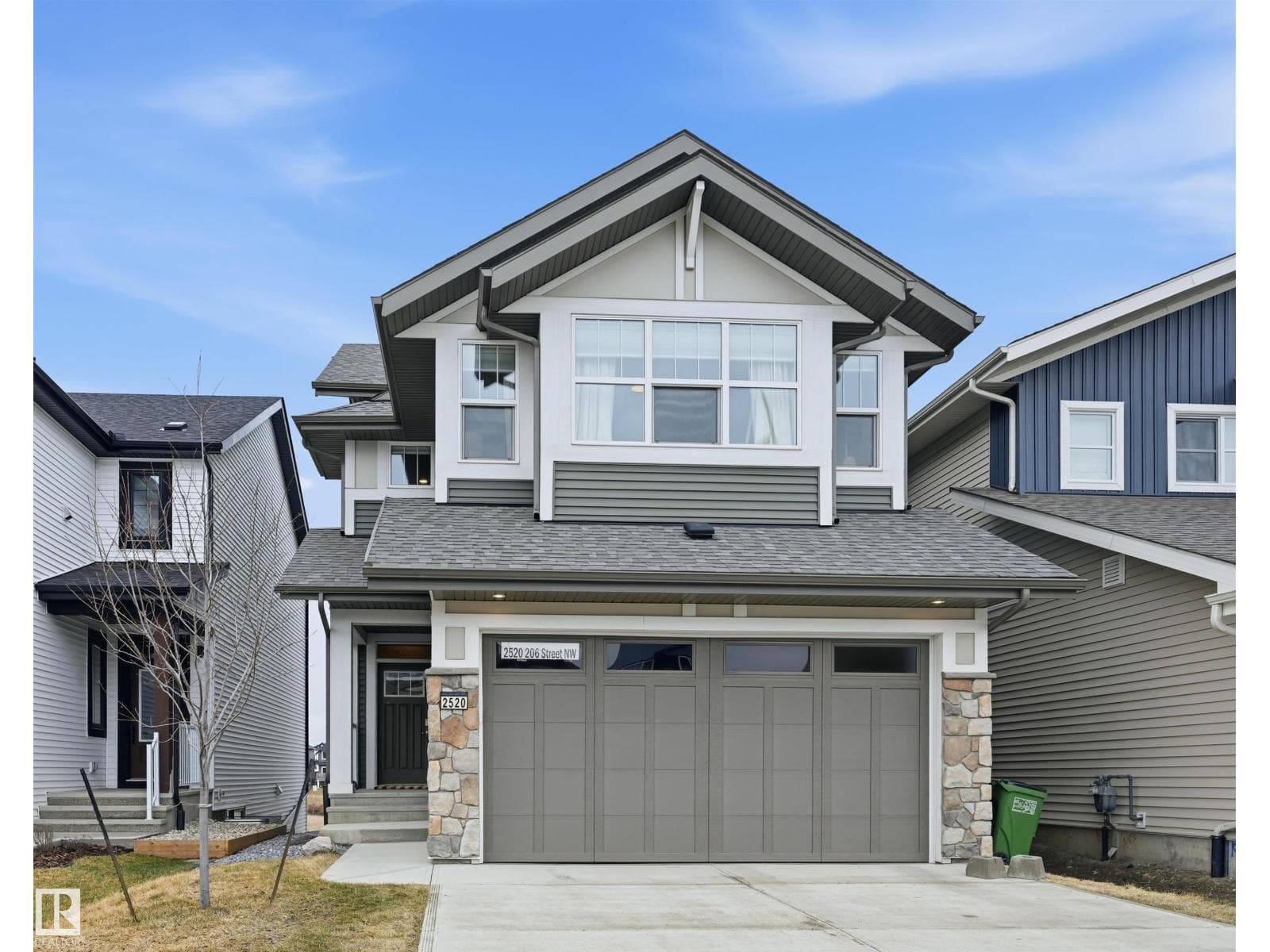 3 bed 3 bath single family at 2520 206 ST NW — $699,800