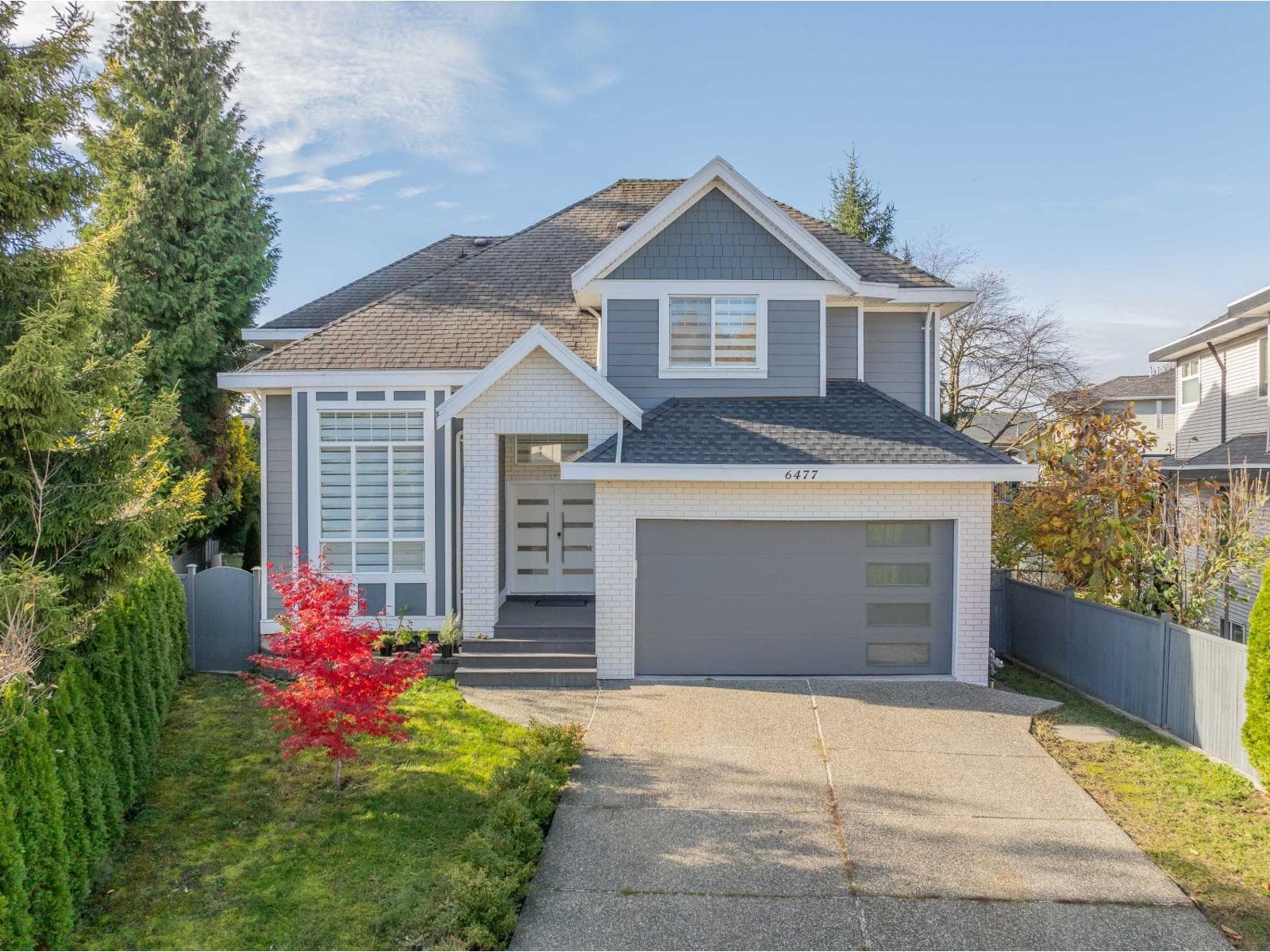 8 bed 5 bath single family at 6477 189 STREET — $1,799,000