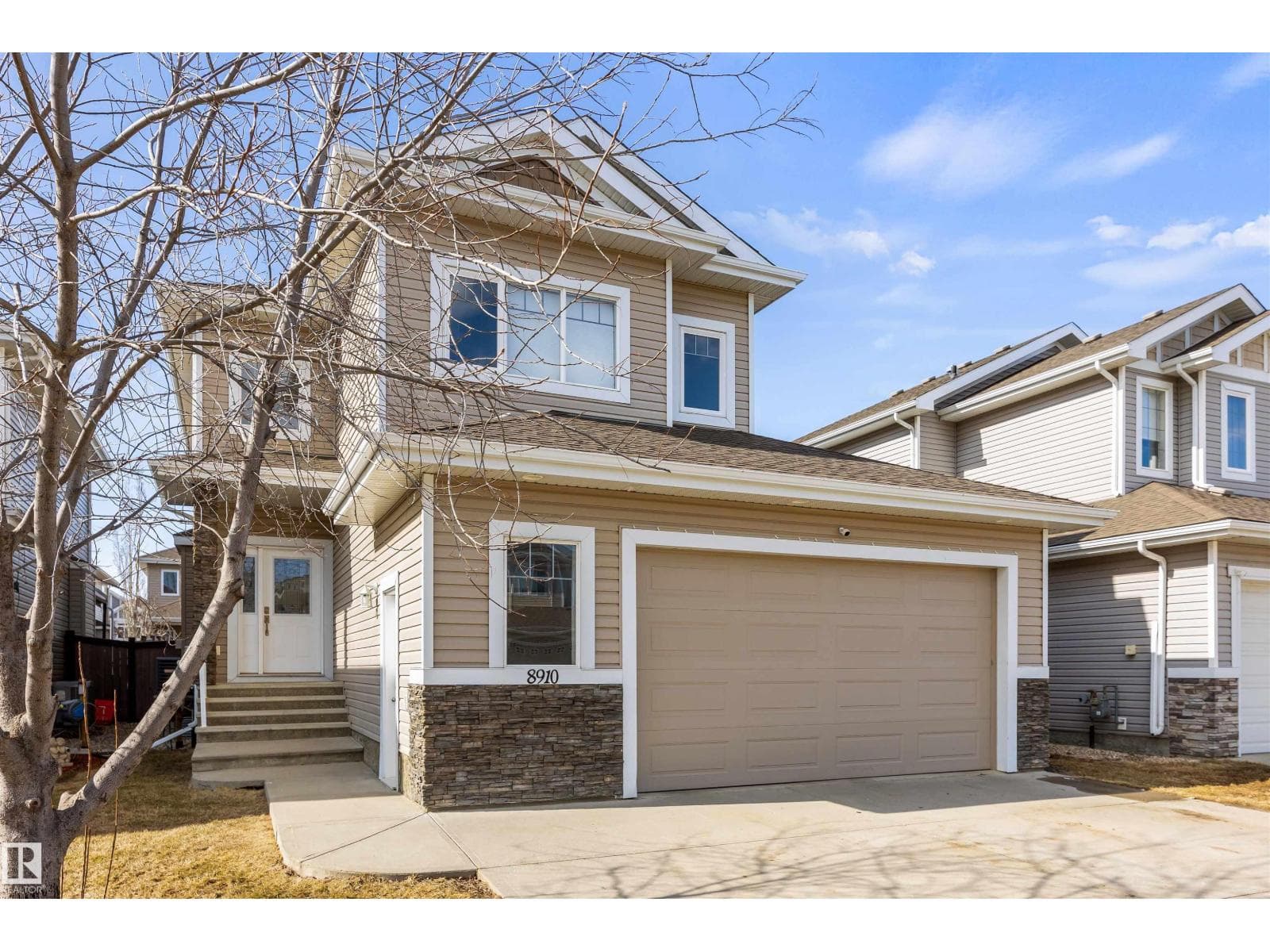 4 bed 4 bath single family at 8910 97 AV — $549,900
