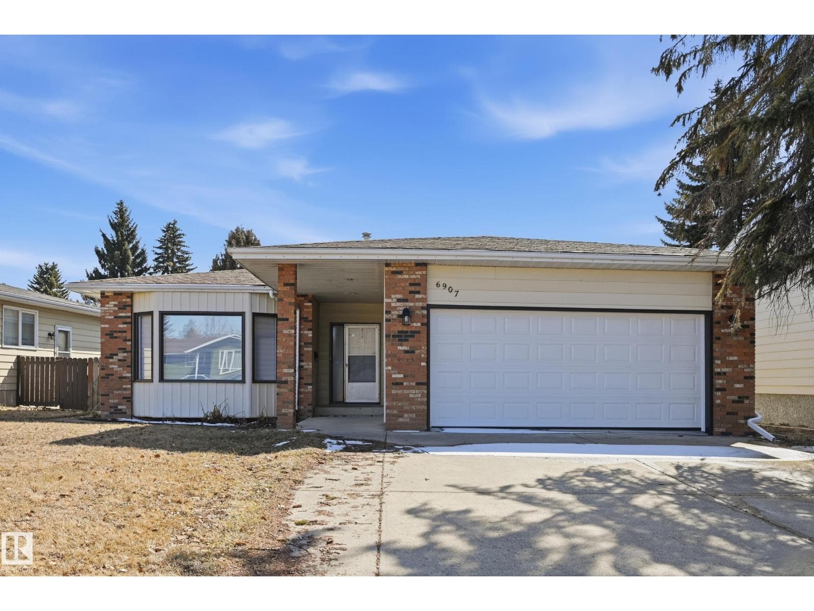 4 bed 3 bath single family at 6907 19 AV NW — $569,900