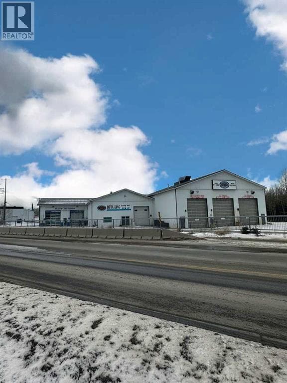 business at 102 Joblin — $1,850,000